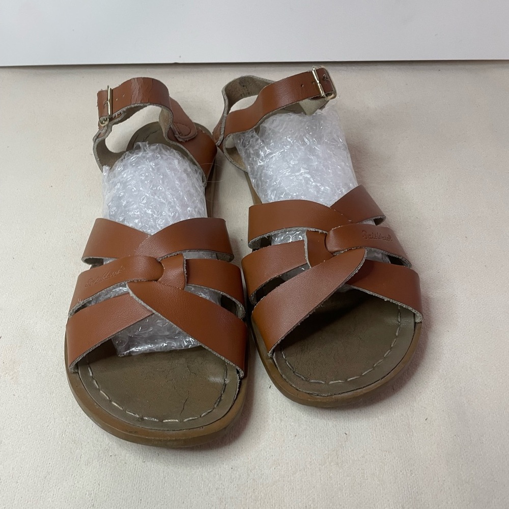 Saltwater sandals woman’s 9, kids 7 in tan